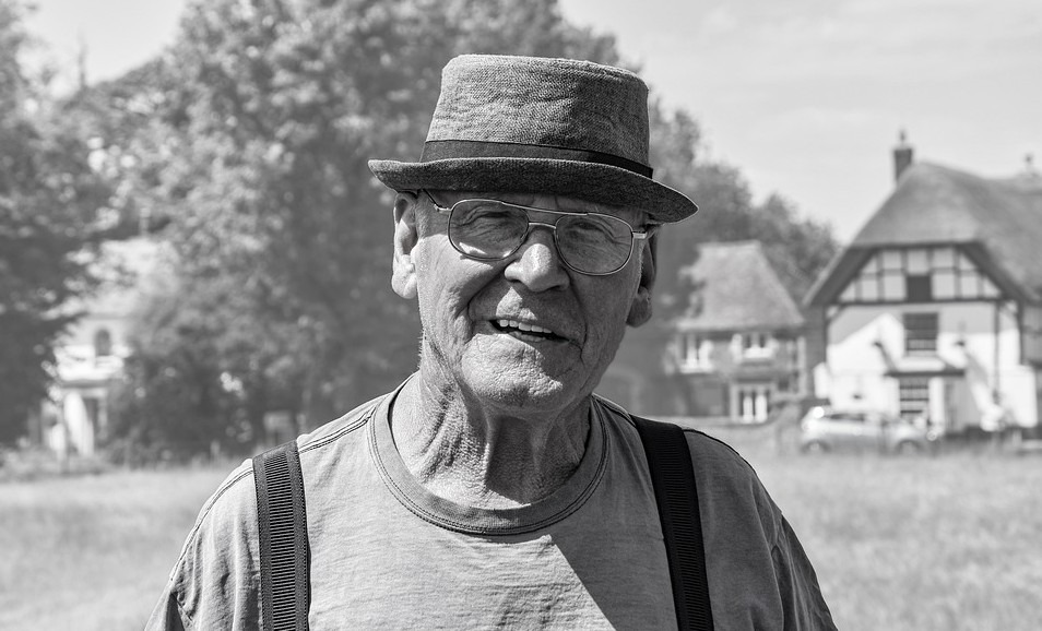 man wearing a pork pie hat