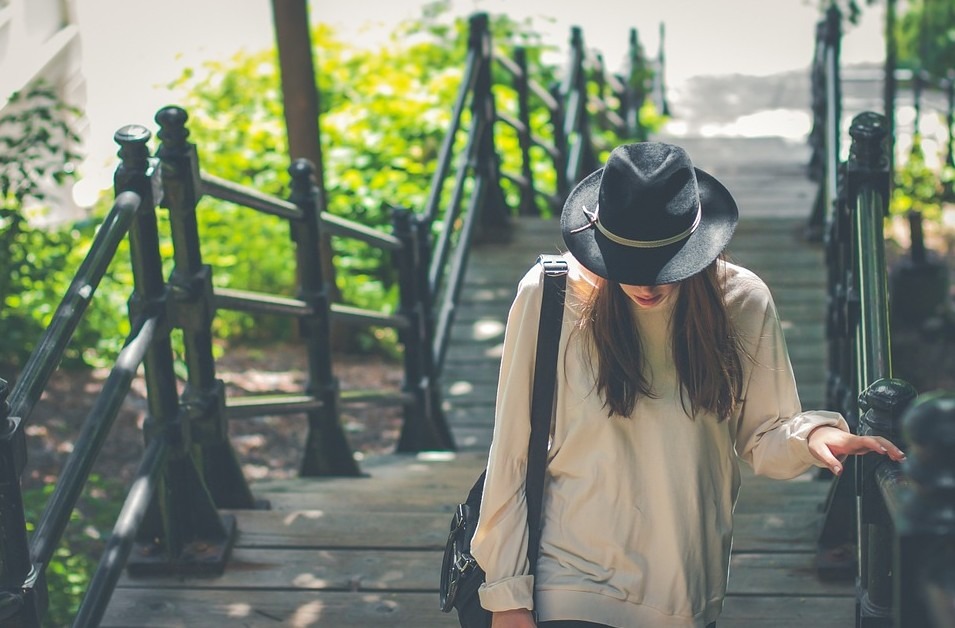 woman wearing a fedora hat