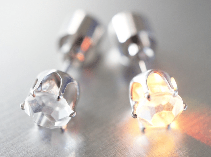 a pair of diamond stud earrings