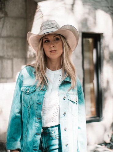 woman wearing a stylish cowboy hat